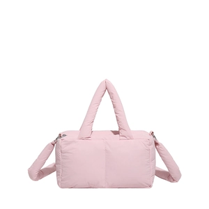 Quilted padded tote bag in soft pink color with top handles and adjustable shoulder strap