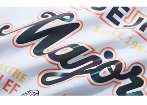 Macro detail of holographic reflective Mayor print on premium white cotton fabric