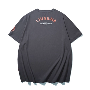 Dark charcoal short sleeve t-shirt featuring pink LIUGEJIA print and round logo detail