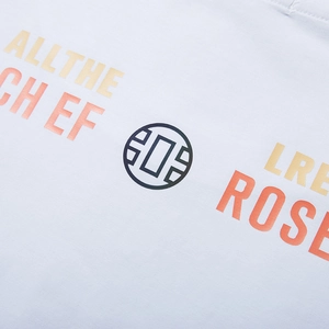 Oversized t-shirt featuring reflective orange gradient graphic print on light blue fabric