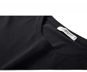 Close-up of the reinforced neckline stitching and 2XL size label on this black t-shirt