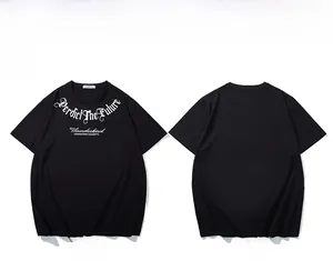 Front and back view of a black cotton oversized T-shirt with gothic white lettering