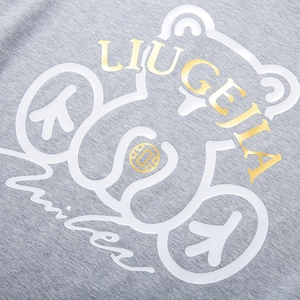 Grey oversized T-shirt with white bear outline and golden LiuGeJia logo print