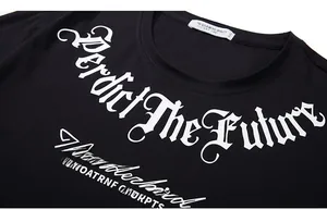 Detail of Gothic lettering and 5XL label on oversized black cotton blend t-shirt