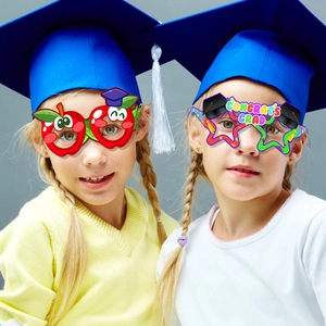 Kids graduation party paper glasses with Congrats Grad text and apple star designs