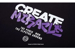 Macro shot of high-quality street style print with CREATE MIRACLE text on black cotton tee