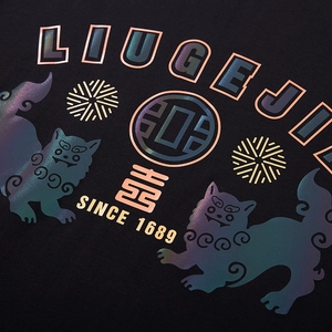 Oversized black cotton T-shirt featuring holographic reflective twin lion graphic print
