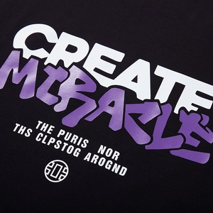 Black cotton T-shirt with purple Create Miracle graphic print in a macro streetwear style