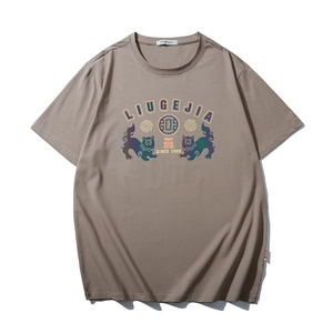 Brown cotton oversized T-shirt featuring reflective double lion print and graphic text