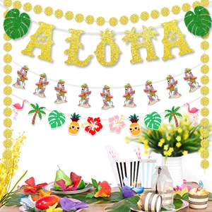 Detail of Hawaii party banners featuring gold glitter Aloha text and flamingo surfboards