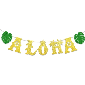 Detail of glitter ALOHA banner with gold pineapple and green palm leaves decoration