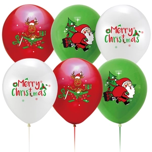 Detailed view of red, green, and white Christmas balloons with Santa and reindeer motifs