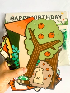 Detail of forest animal birthday banner cards with colorful jungle illustrations and motifs