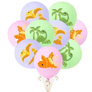 Detail of pink and purple dinosaur balloons with cartoon patterns for birthday parties