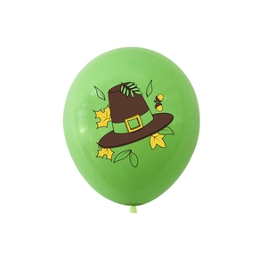 Detail of green Thanksgiving balloon featuring a pilgrim hat and autumn maple leaf prints