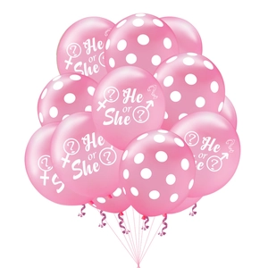 Pink latex balloon detail with He or She print and polka dots for gender reveal party