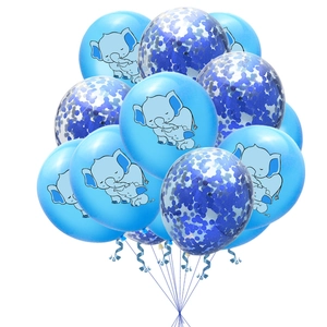Close-up of blue elephant print balloons and transparent confetti balloons with ribbons