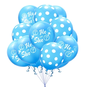 Blue He or She gender reveal balloons set with white dots and ribbons for party decoration