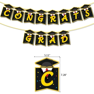 Close-up of Congrats Grad bunting banners with graduation cap and gown design elements