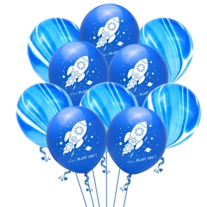 Detail of 12-inch astronaut rocket balloons and blue agate marble set for party decor