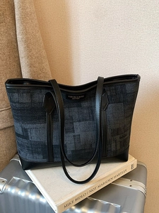 Spacious jacquard tote bag with leather handles for daily commuting and office work