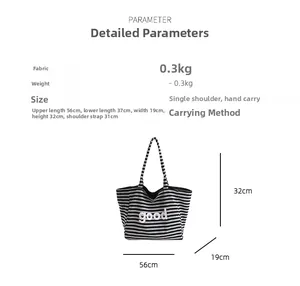 Detail view of large striped canvas tote bag with size dimensions and 'good' text print