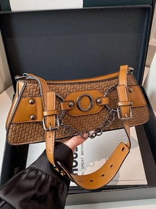 Brown woven motorcycle bag with metal chain and adjustable strap in punk retro style
