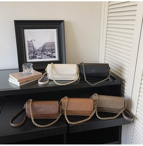 Detailed collection of vintage baguette bags in five colors with golden chain handles