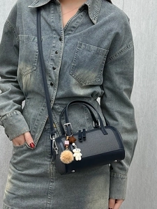 Dark blue Boston shoulder bag with plush bear charm and adjustable strap for women