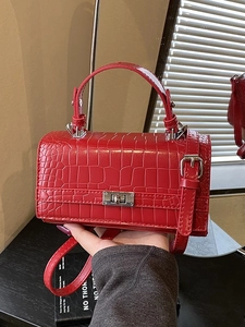 Red crocodile texture mini handbag with silver square lock and leather shoulder strap