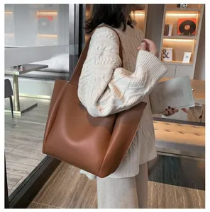 Grote PU-leren shopper met bruin kleurblok-patchwork en brede comfortabele schouderband