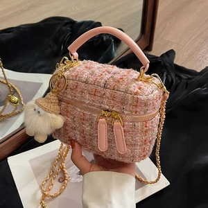 Pink tweed small square handbag with chain strap and plush doll charm in mirror setting