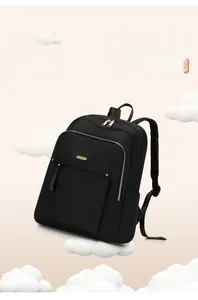 Detail shot of a black Oxford cloth backpack showing 0.34kg lightweight construction