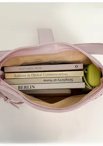 Macro shot showing large interior capacity of pink leather tote bag with fabric lining