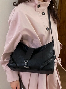 Fashionable black matte crossbody tote bag with silver hardware for chic daily commute