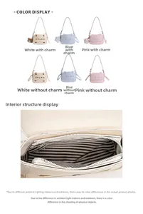 Detailed view of the striped lining and internal zipper compartment of the cat ear bag