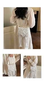Detalle de un bolso de ganchillo blanco hecho a mano con flecos y patrones tejidos boho