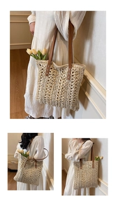 Detail of woven straw tote bag featuring leather shoulder straps and intricate hand-stitch