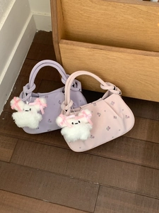 Floral print dumpling bags in pink and purple with cute plush bunny charms