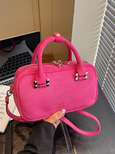 Rose red suede baguette handbag with silver bone buckle and embossed Rosy Podenia text
