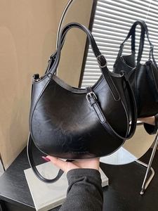 Classic black crescent hobo bag with adjustable strap and textured leather finish