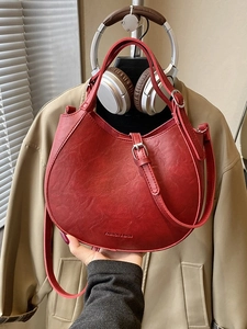 Vintage red half-moon saddle bag for women with fashion lettering and leather texture