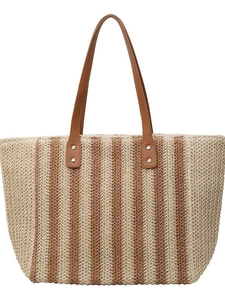 Large striped straw tote bag with brown leather handles for beach or daily commute
