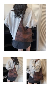 Detailed views of a large canvas Hobo shoulder bag with brown abstract plaid pattern
