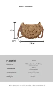 Detail view of woven straw saddle bag with adjustable strap and product dimensions