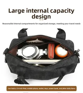 Interior view of black canvas tote bag showing large capacity for gadgets and books