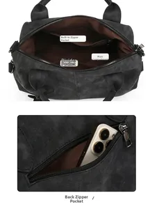 Internal compartments and anti-theft rear zipper pocket of a black matte Boston handbag