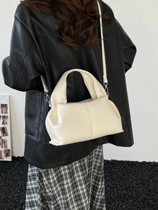 Minimalist creamy white cloud-shaped handbag with soft PU leather and adjustable strap