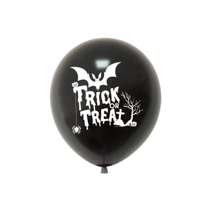 Detail of black latex balloon with white Trick or Treat print for Halloween party decor