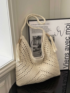 Bohemian off-white crochet shoulder bag with hollow diamond knit and fringe tassels